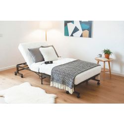 Cama articulada plegable motorizada de tejido y metal en negro, 195 x 85 x 40,5 cm | Mine