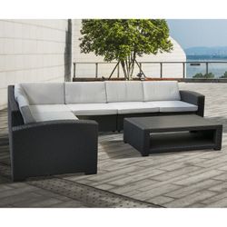 ELVA - Set da giardino in resina con 2 divani angolari + tavolo grigio antracite