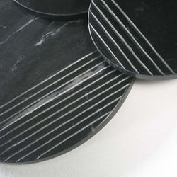 Black marble sculpture, 56x4x56 cm