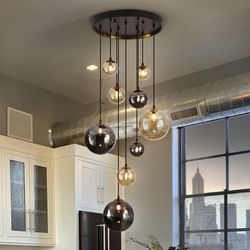 9-jasna kryształowa i ciemnoczarna/złota metalowa lampa sufitowa, Ø55x140 cm