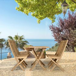 Honey-colored teak garden dining set | Naga + Mati