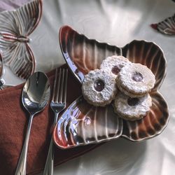 Earthenware bread plate in terracotta, 14.6 x 18.4 x 4.2 cm | Cloudy Butterflies