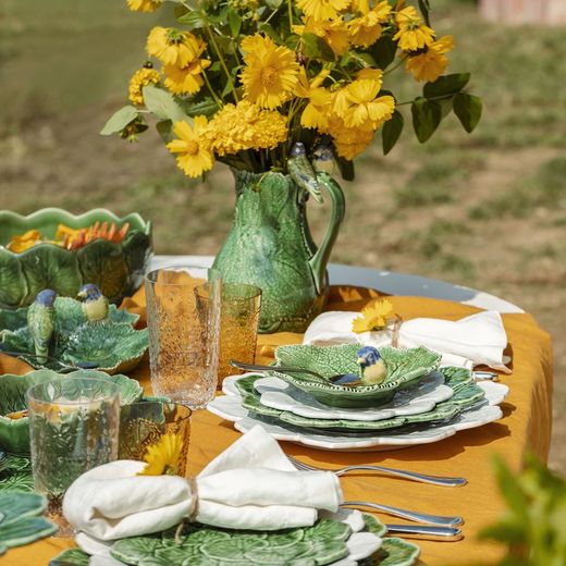 24-piece white and green stoneware dinnerware set | Geranio
