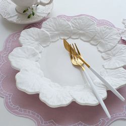 24-piece white and green stoneware dinnerware set | Geranio